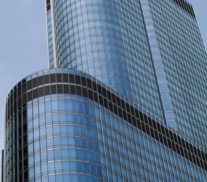 Glass office tower against the sky